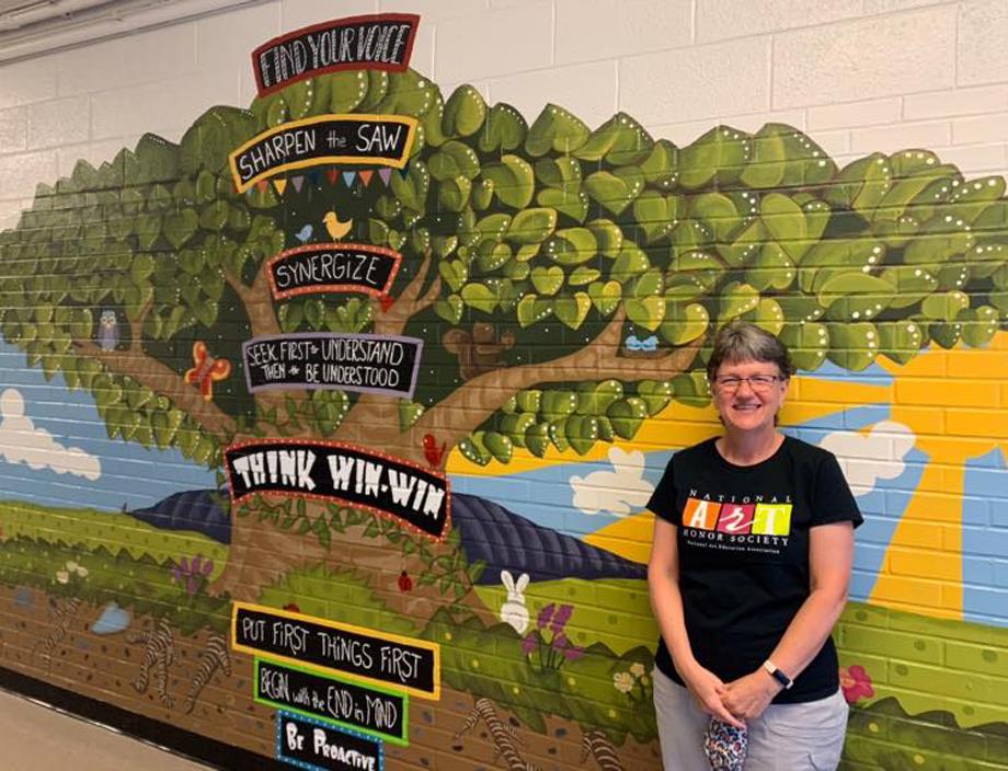 North Gaston High School art teacher Tammy Hovis organized an art project at Carr Elementary that involved high school students painting a mural of the Leader in Me โ7 Habits of Happy Kids.โ